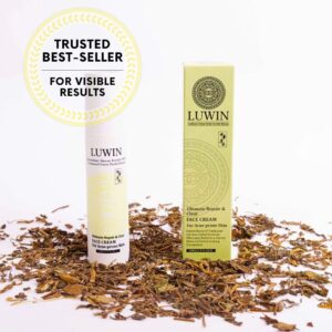 LUWIN Ultimate Repair & Clear Face Cream for acne prone skin elegant white bottle and yellow theme box packaging, with dried Chinese herbs laying around. To left corner says Trusted Best-seller, For visible results.