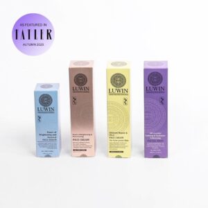 A lineup of LUWIN Power of Brightening & Renewal Face Serum, Power of Brightening & Rejuvenating Face Cream, All-rounder Calming Facial Mist, and Ultimate Repair & Clear Face Cream, each in their unique elegant colourful box packaging.