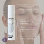 A close-up of a woman applying cream to her face, with a LUWIN Ultimate Repair & Clear Face Cream for Acne-Prone Skin bottle in the foreground. Text highlights benefits including addressing clogged pores, excess oil, and inflammation, diminishing acne breakouts, redness, blemishes, and marks, while promoting an even-toned and healthier complexion. The product is rooted in Traditional Chinese Herbal Remedies.